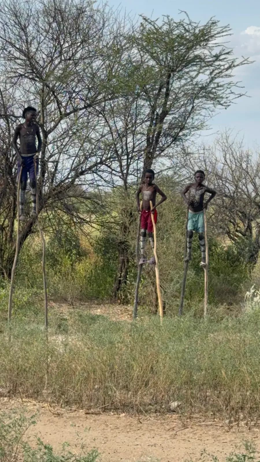 Banna stilt-walkers in the bush