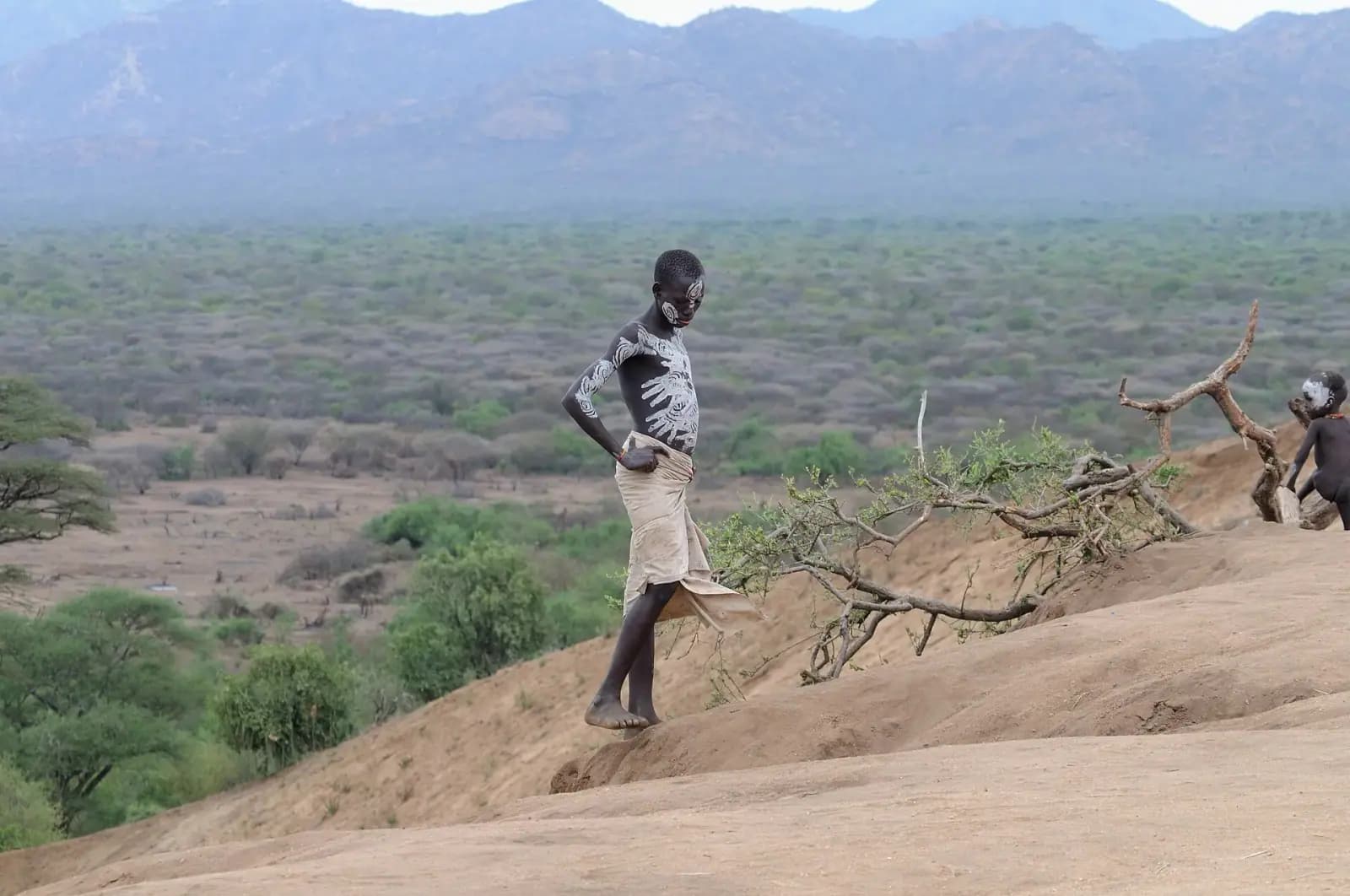 Karo youth overlooking the great bend of the Omo Valley